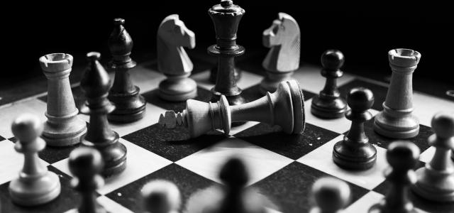 chess pieces on board by Felix Mittermeier courtesy of Unsplash.